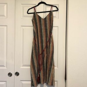 Long dress, shortened sleeves.